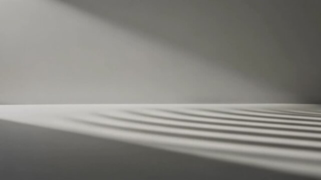 Dynamic interplay of light and shadow creating abstract patterns on a minimalist wall and floor, evoking a serene and contemplative architectural space