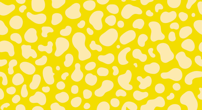 Vibrant yellow and cream seamless pattern with abstract organic spots. Retro pop art cowhide animal print background.
