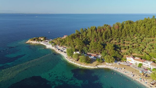 Aerial View of Limenas Beach with People Swimming in Thasos Greece
