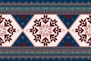 Modern ethnic geometric seamless pattern with large diamond motif and traditional ikat embroidery style. Luxury blue and white tribal floral border for textile, fashion fabric, wallpaper. © Umpa 