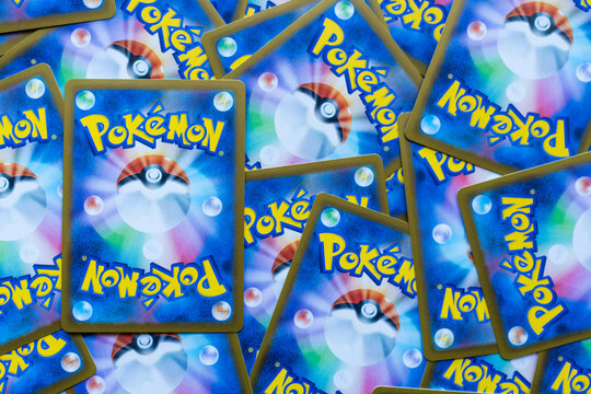 Bangkok, Thailand - June 15, 2026 : Collection of the backs of authentic used Pok&eacute;mon trading cards banner heading.