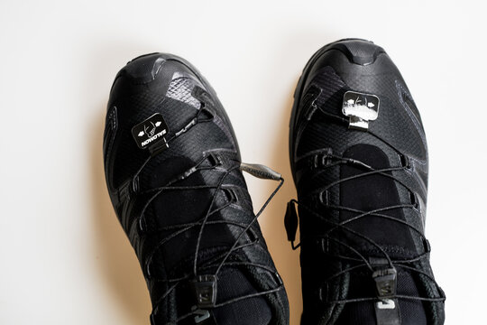 Bangkok, Thailand - June 27, 2026 : Salomon XA Pro 3D V9 Wide GTX in Black, Minimalist and strong lacing for one-pull tightening.