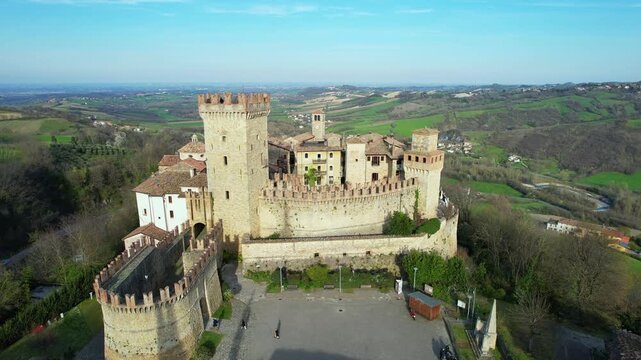 Drone view footage of Vigoleno Castle and medieval village in Vigoleno, Italy. Historic fortified hilltop destination in Emilia Romagna, ideal for tourism, travel, lifestyle and cultural vacation 