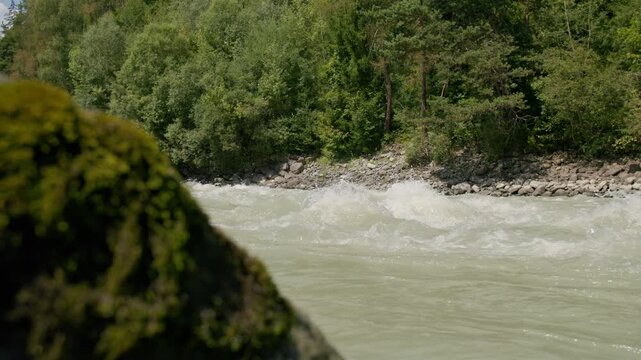 Nature landscape of the Otztaler Ache River in Tyrol Austria featuring fast mountain currents alpine forests and tourism in Europe