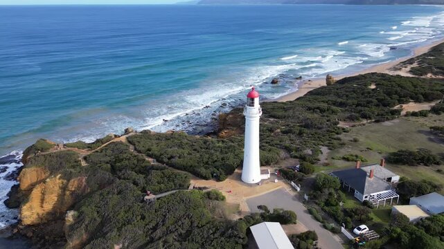 Aerial view Aireys Inlet Lighthouse Australia. Beautiful nature landscape lighthouse on top of a cliff, travel and tourism on the southern ocean coast in Victoria.