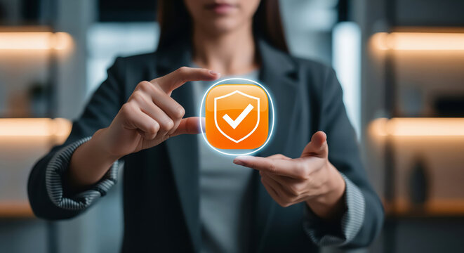 Secure identity approval in a woman hand highlights shield checkmark for account safety, password protection, insurance claim review and trusted access confirmation in online service process