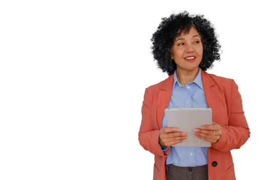 Businesswoman holding digital tablet, smiling, looking away, reflecting on ideas for future success and innovation