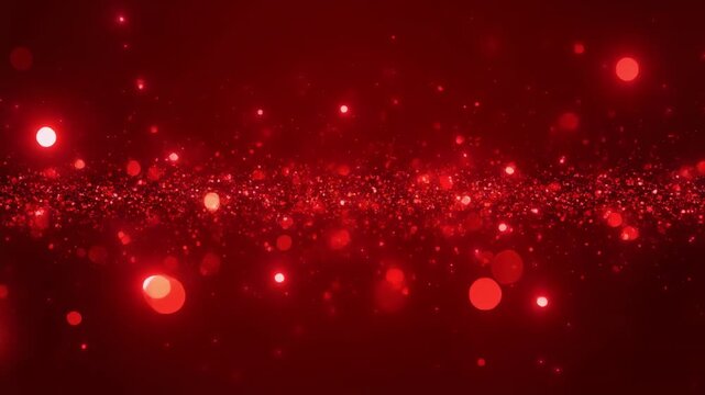 red glowing particles floating in dark space animation