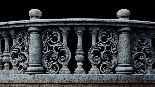 Ornate stone balustrade with detailed carvings against dark background