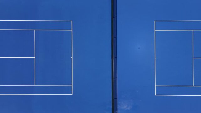 4K top-down aerial view on a tennis court 