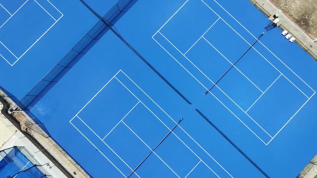4K top-down aerial view on a tennis court 