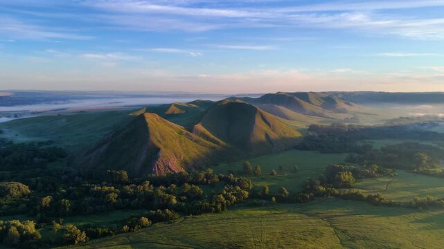 Andreevskie Shishki&mdash;velvety hills on the border with Bashkiria in the Orenburg region&mdash;at dawn, shrouded in mist.