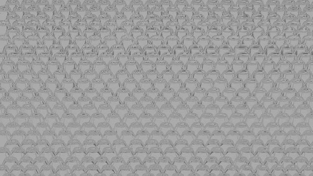 Silver metallic abstract backdrop showing repeating cone shapes with clean glass texture.