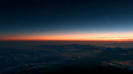 Fototapeta premium A vibrant gradient horizon under a starlit night sky showcases natural textures and deep colors