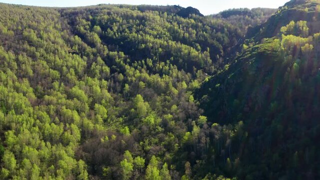 Southern Urals in spring: the Irendyk ridge and the Khudolaz River. Aerial view.
