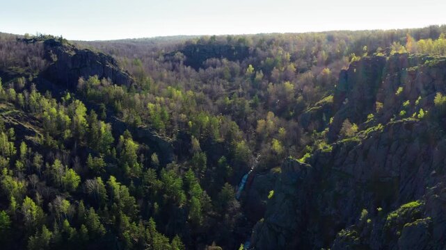 Southern Urals in spring: the Irendyk ridge and the Khudolaz River. Aerial view.