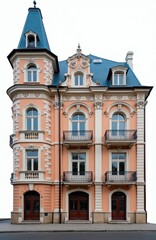 Obraz premium Ornate peach colored building with blue roof and tower. Features multiple arched windows balconies and detailed facade ornamentation. Two dark wooden doors on ground floor.