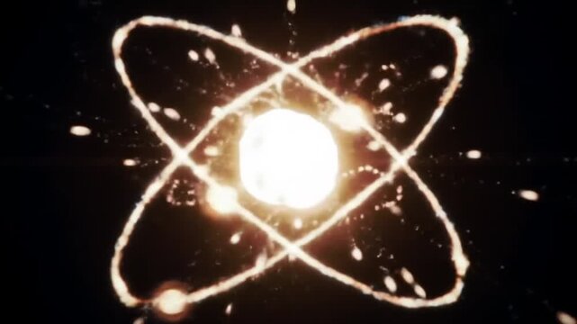 Glowing atom model with orbiting electrons on dark background
