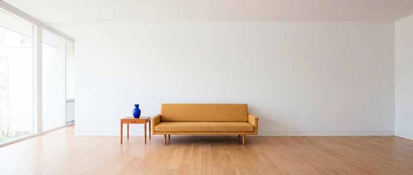 Panoramic minimalist living room mockup with mustard sofa and blank white wall