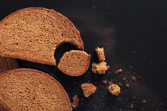 Slices of rye bread with crumbs