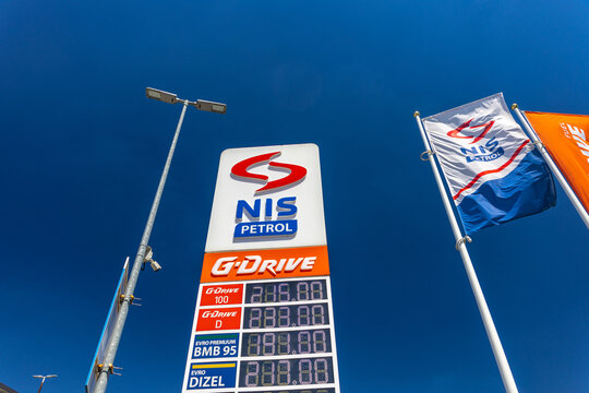 NIS Petrol Fuel Station Totem and Flag Against Blue Sky in Valjevo, Serbia