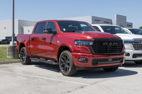 Ram 1500 Laramie Crew Cab 4X4 truck at a dealership. Ram offers the 1500 with a 5.7L HEMI eTorque V8 engine. MY:2026
