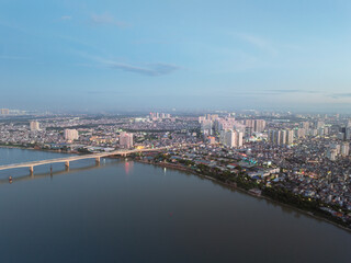 Fototapeta premium Vinh Tuy Bridge over Red River in East Hanoi Vietnam