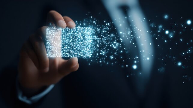 Businessman holding glowing digital data representing technology and innovation