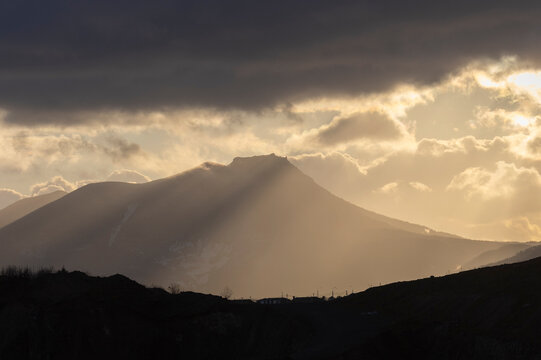 Mendeleev volcano at sunset in winter, Kunashir, South Kuril Islands. Russia
