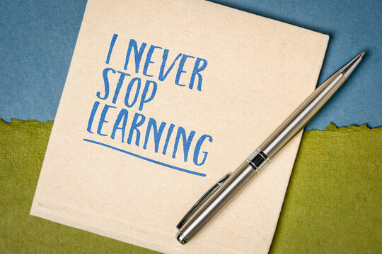 I Never Stop Learning &ndash; positive affirmation handwritten on a napkin, symbolizing lifelong learning, curiosity, personal growth, self-improvement, and a growth mindset.