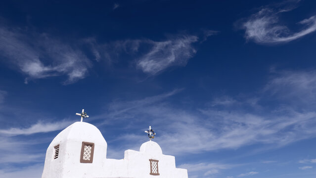 White Mission Church Roof Against Dramatic Desert Sky