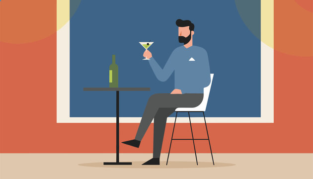 Man sitting at a bar table holding a martini glass with an olive in a stylish setting with warm lighting and a blue window frame.