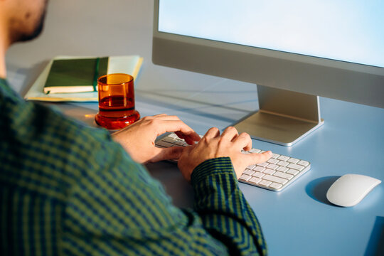 A computer monitor with a white screen on the table