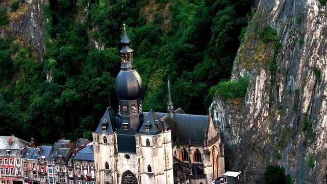 Scenic Dinant Belgium Cityscape with Notre Dame Collegiate Church and Meuse River Waterfront