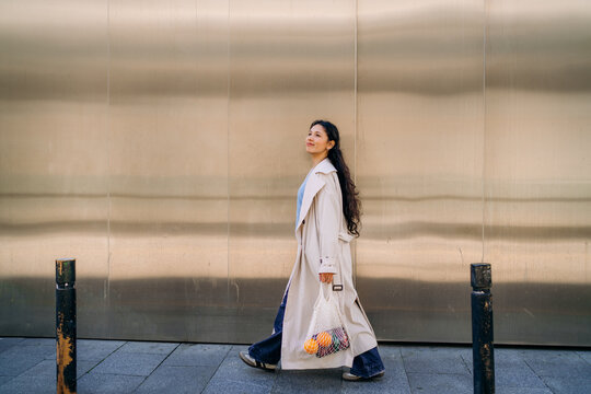 A woman walking on a city street