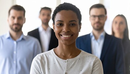 Fototapeta premium leadership concept with one person standing ahead of group, business management theme
