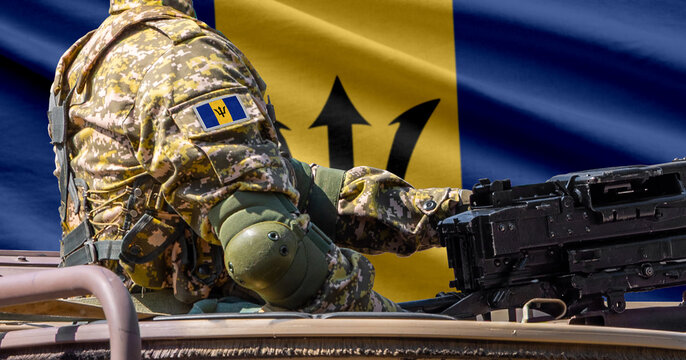 Barbados flag with soldier at machinegun turret