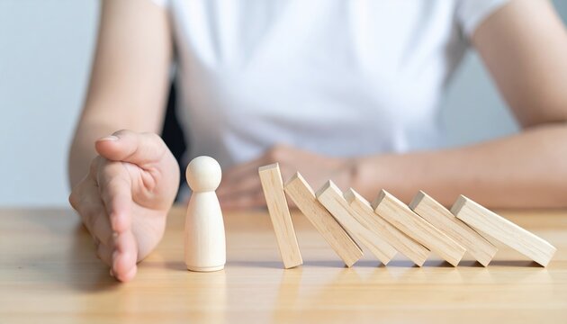 Employee layoff and workforce reduction concept with removed wooden figures, business restructuring metaphor
