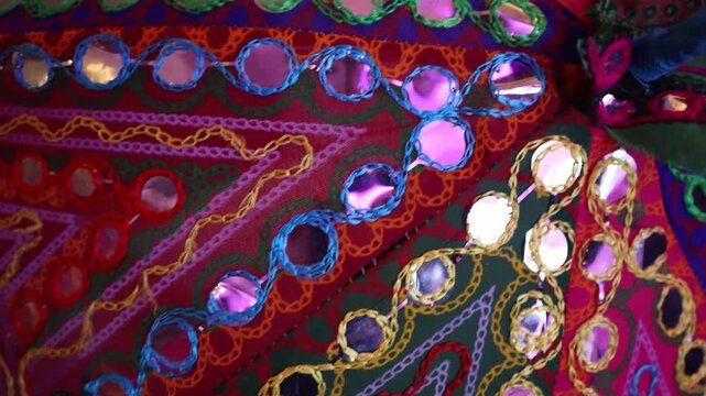 Colorful embroidered fabric with mirror work