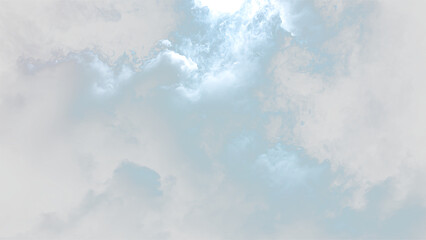 Clouds drift across the sky with patches of light breaking through in a bright blue backdrop © Liubov