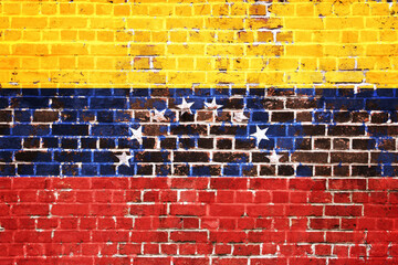 Vibrant Venezuelan Flag with Eight White Stars Painted on a Rustic and Weathered Red Brick Wall Texture © Mulkan