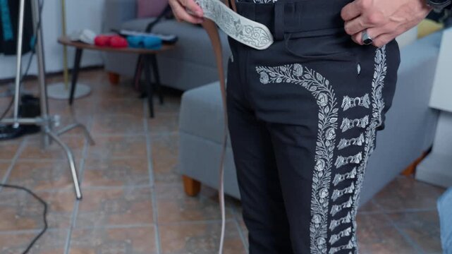 Mexican mariachi artist dressing in charro suit