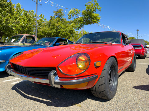 Red Datsun 240Z Sports Car At Outdoor Car Show