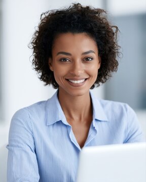Young professional smiling after completing online certification course, continuous learning concept