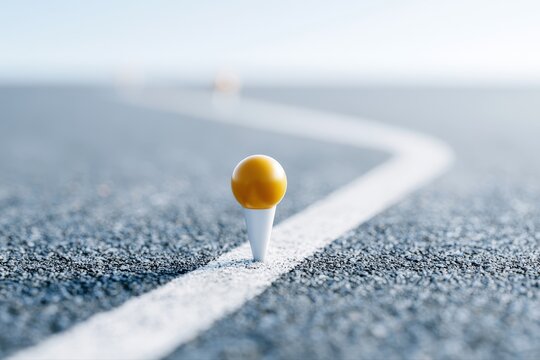Close-up of milestone markers on a success journey roadmap, planning concept