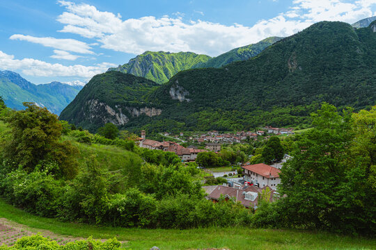 The view of Lake Tenno, a splendid alpine lake nestled between mountains and woods, near Lake Garda, near the town of Tenno, Trentino, Italy - May 2026