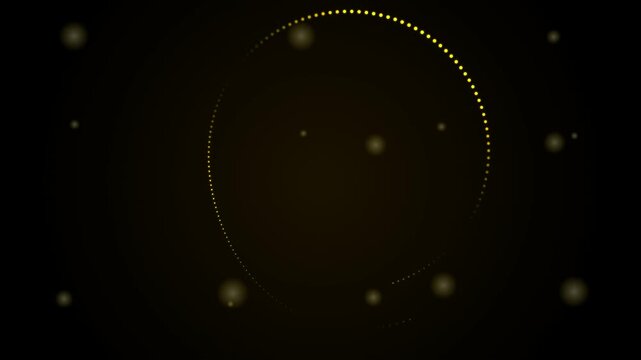 Abstract yellow light particle circle motion on dark background