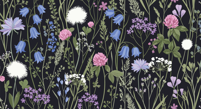 Seamless botanical pattern of colorful wild flowers, clover, bluebells, and green grasses on deep dark background.