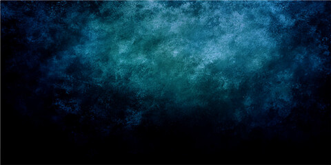 Abstract textured blue and teal smoke or gas clouds with dark black bottom creating atmospheric moody background and grunge effect. © Zìyóu