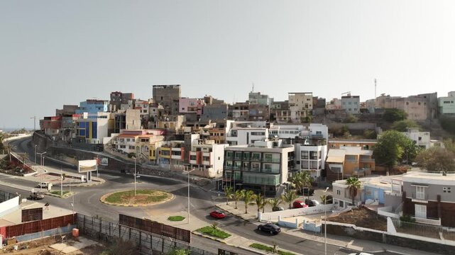 Praia, Cape Verde - colorful hillside houses and roundabout, aerial drone view